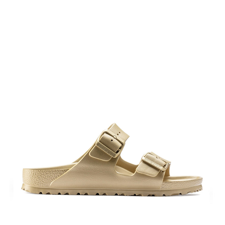 Zijaanzicht van de Birkenstock Arizona EVA slipper in glamour goud voor dames en heren waterdicht model