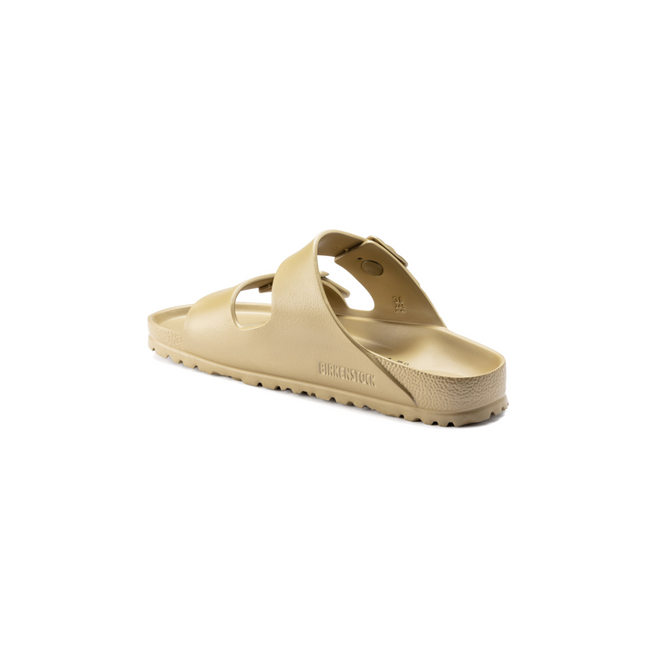 Achteraanzicht van de glamour gouden Birkenstock Arizona EVA slipper met anatomisch voetbed en open hiel