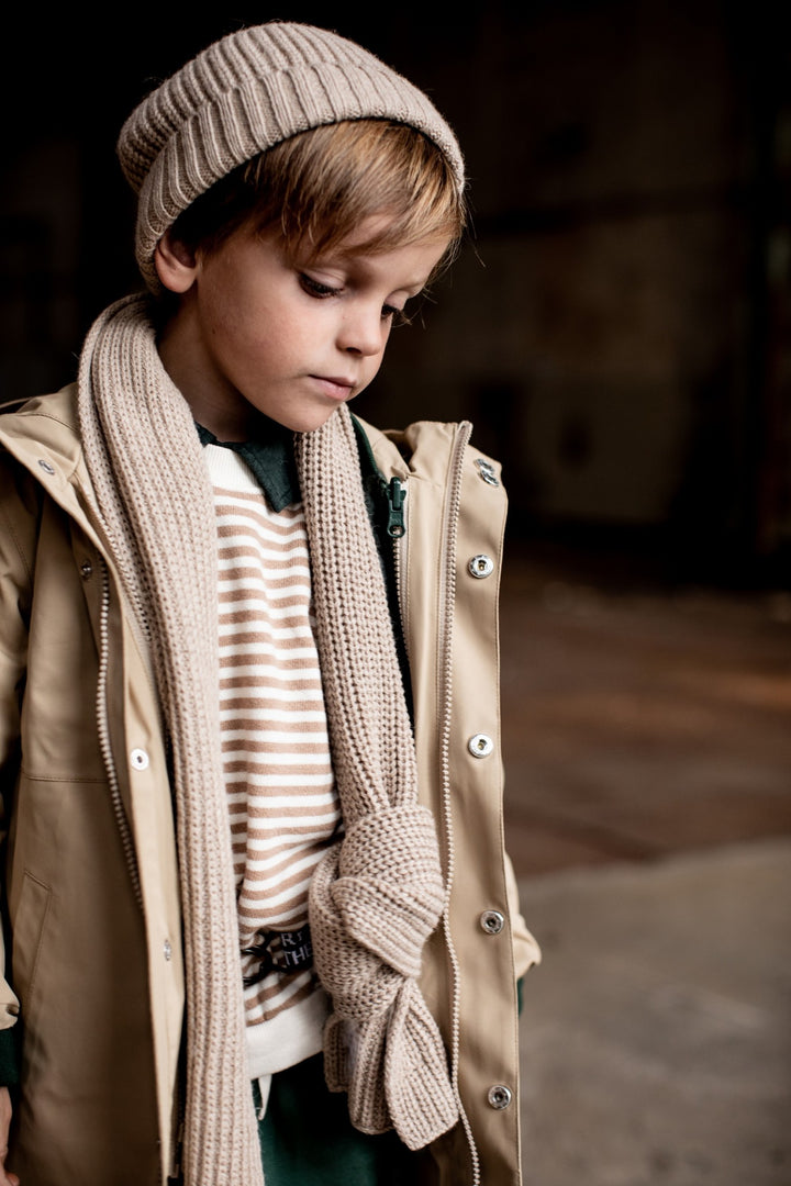 Beige gebreide sjaal
