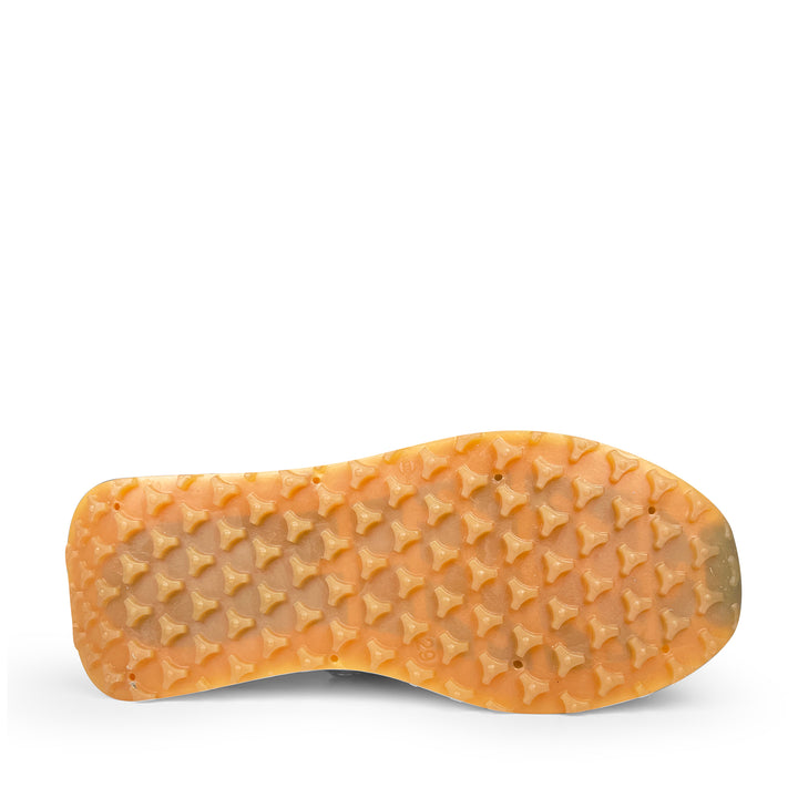Zool van de Rondinella kindersneaker met oranje rubberen noppenprofiel voor extra grip