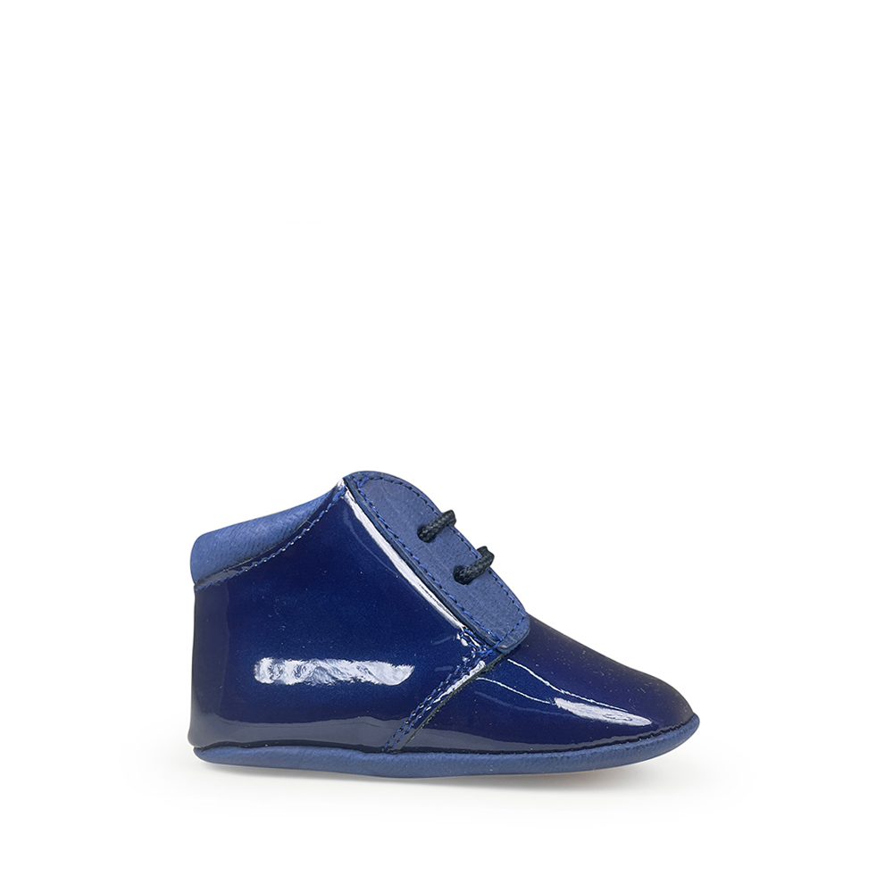 Glanzende prestapper in donkerblauw