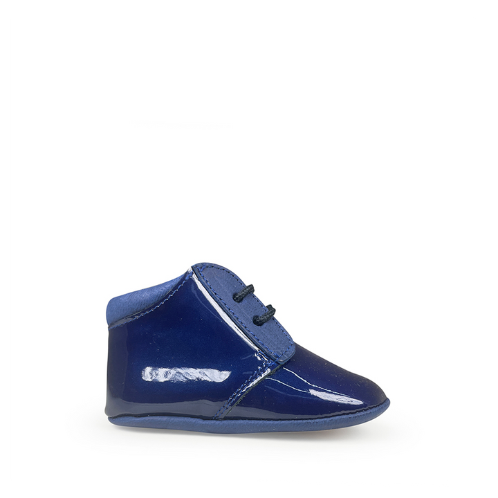 Glanzende prestapper in donkerblauw