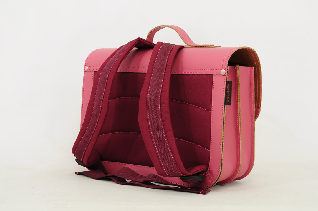 Lederen boekentas in roze met gespsluiting