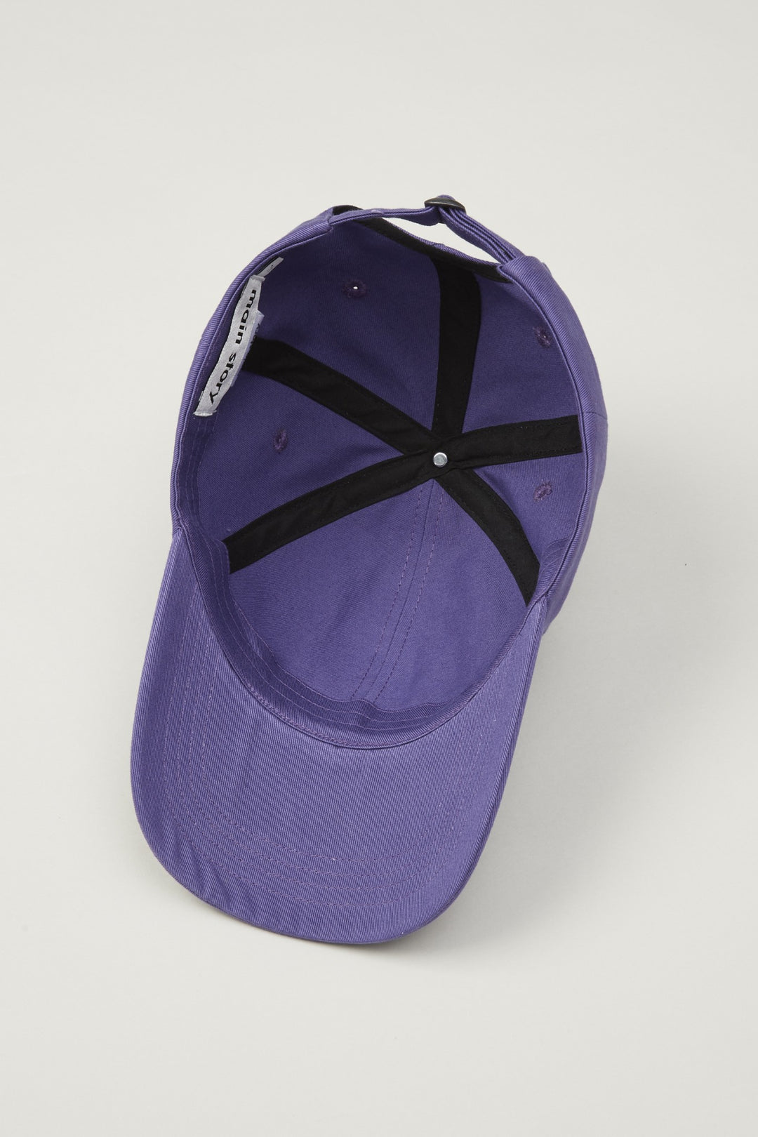 Purple cap with logo Main Story