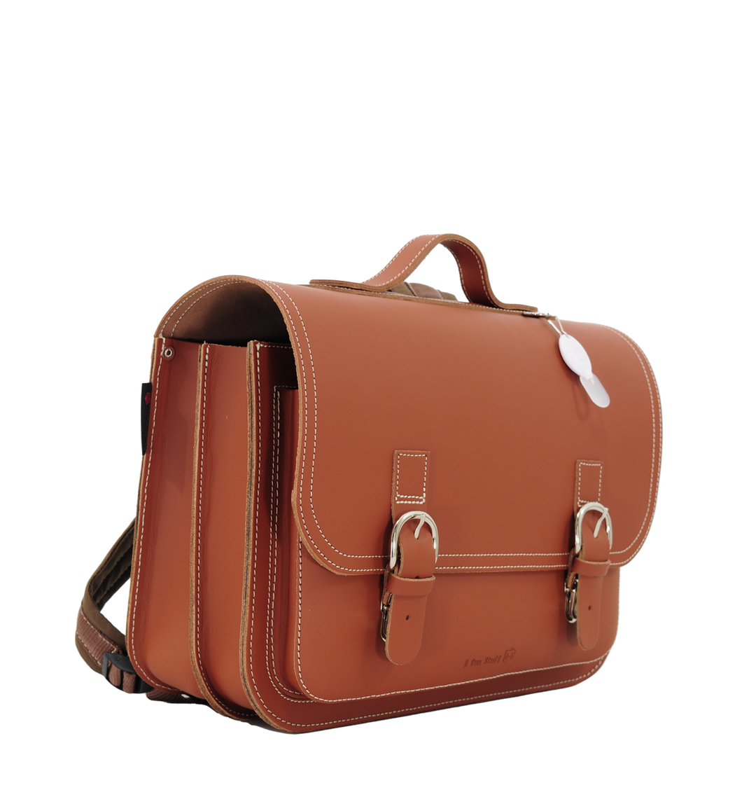 Leather school bag in cognac/brown with buckle closure