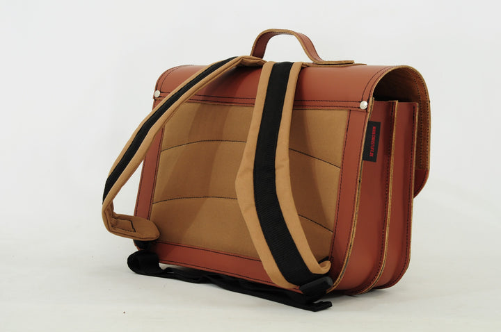 Cognac leather dino book bag with magnetic closure