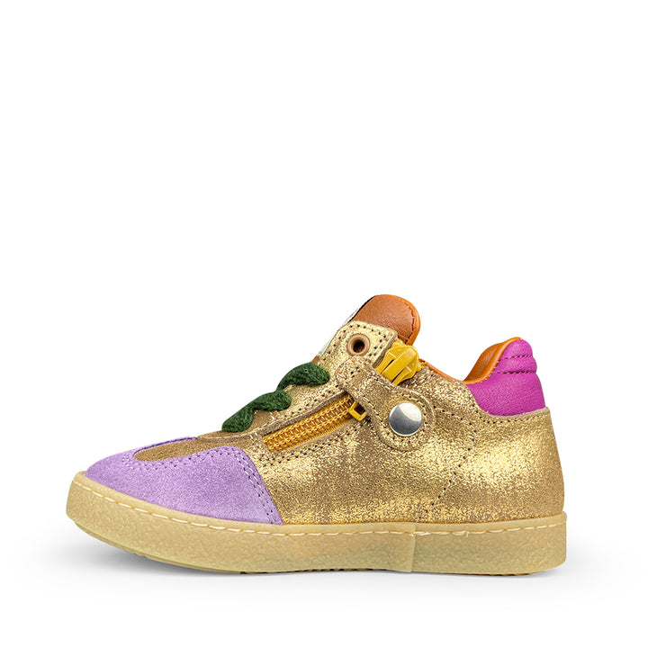 Gouden sneaker met groen