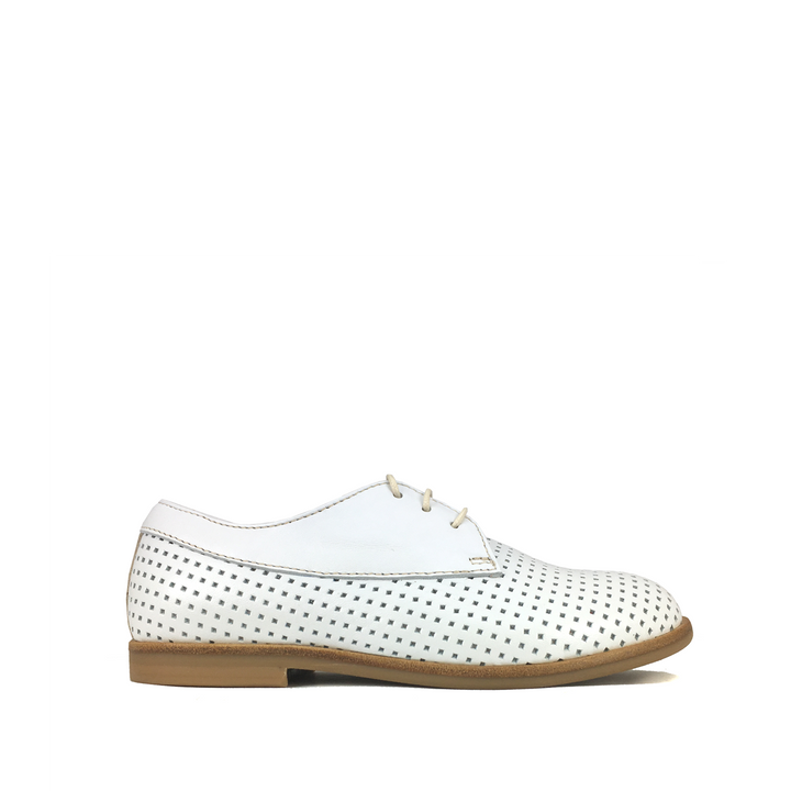 White lace-up shoe with holes