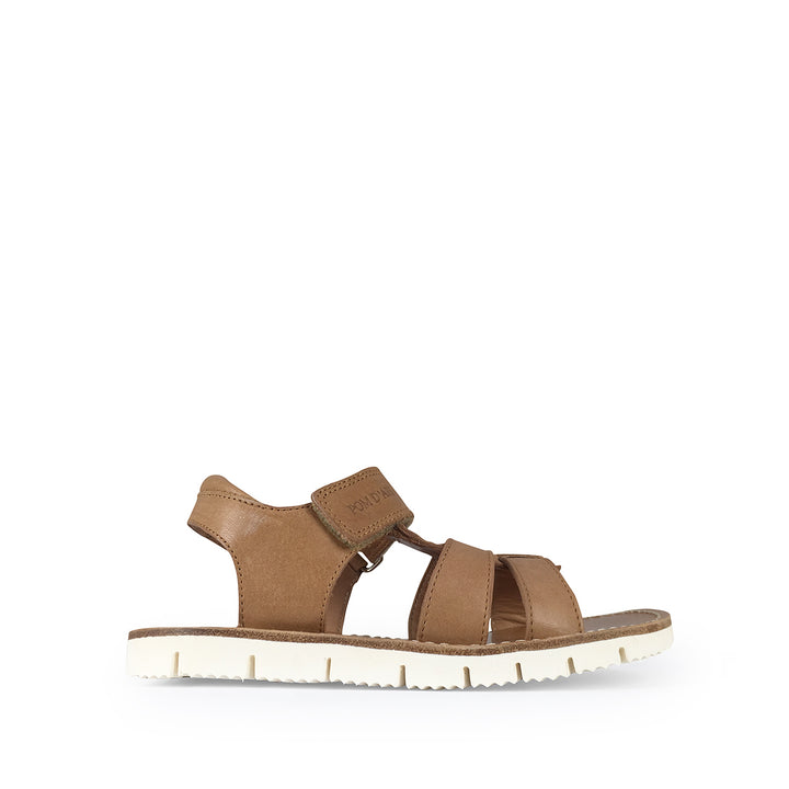 Brown sandal on white sole