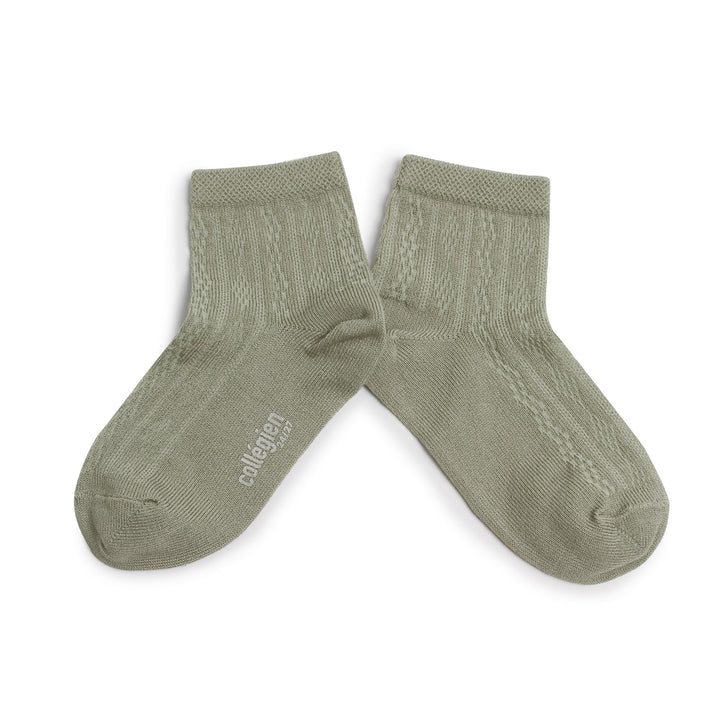 Light green socks with Collégien drawing