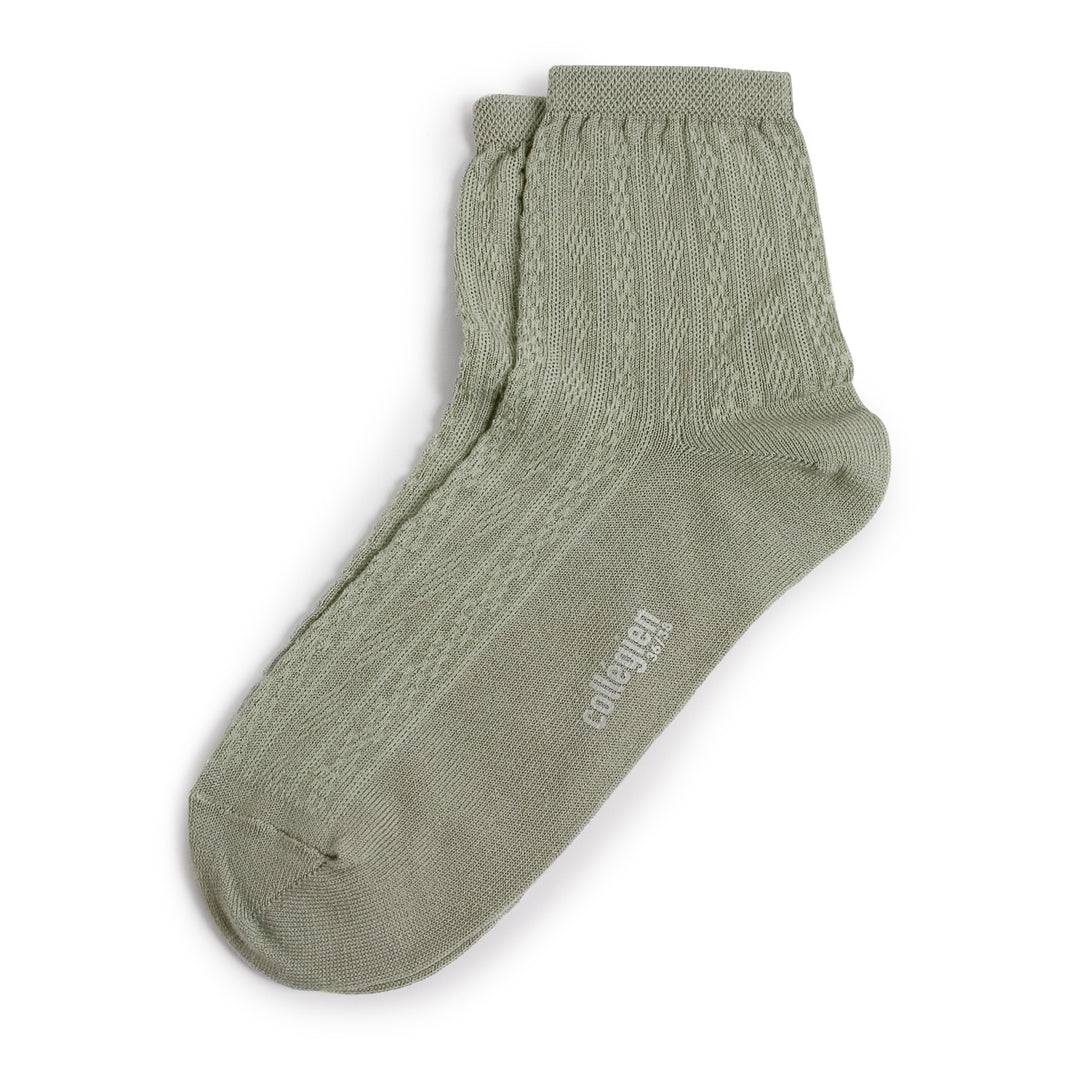 Light green socks with Collégien drawing