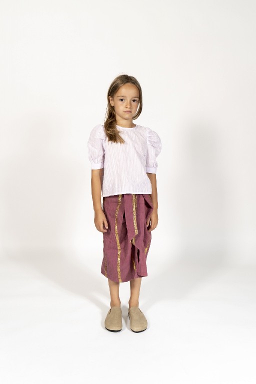 Simple Kids skirts Long burgundy-colored skirt with gold detail.